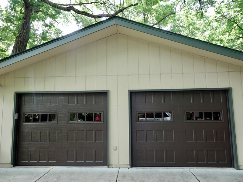 Amarr Hillcrest 3000 in Dark Brown with Recessed Panels and Thames Windows.  Installed by Augusta Garage Door in Kimball, MN.