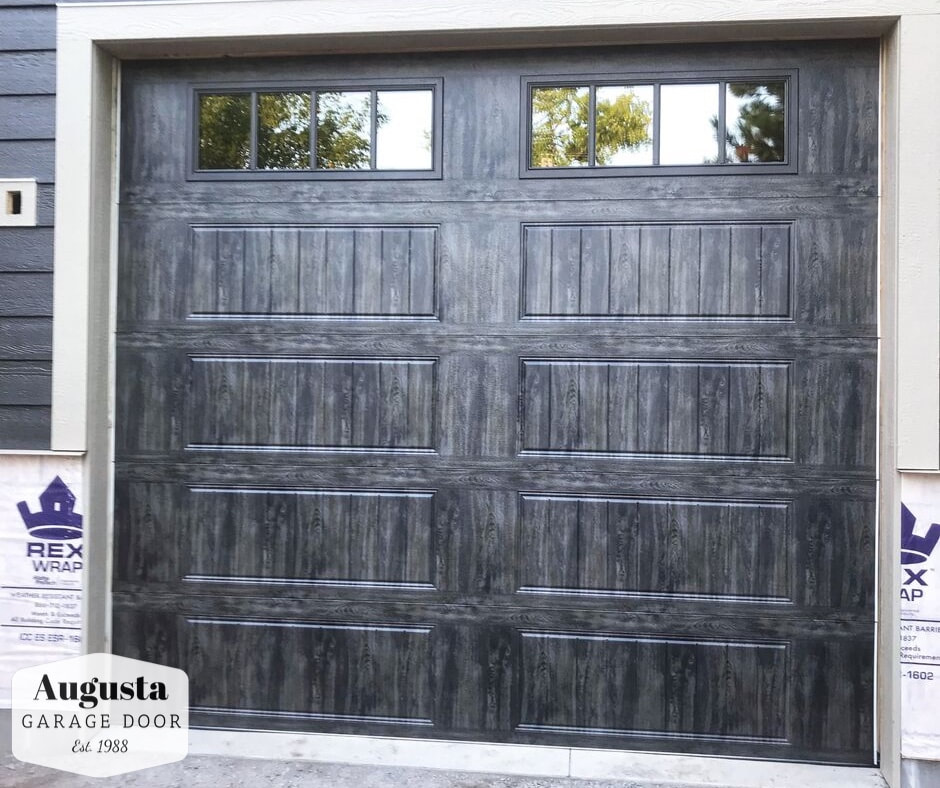 Clopay Gallery Collection in Ultra-Grain Slate with REC14 Windows.  Installed by Augusta Garage Door in South Haven, MN.