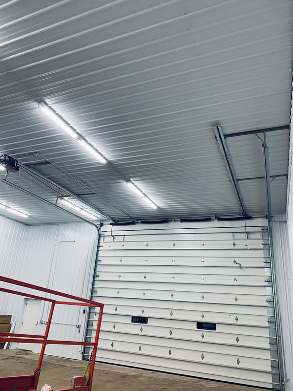 Wayne Dalton Thermospan 200 with LiftMaster Dual Trolly Operator.  Installed by Augusta Garage Door in Clear Lake, MN.